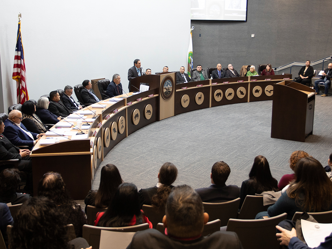 committee table with logos
