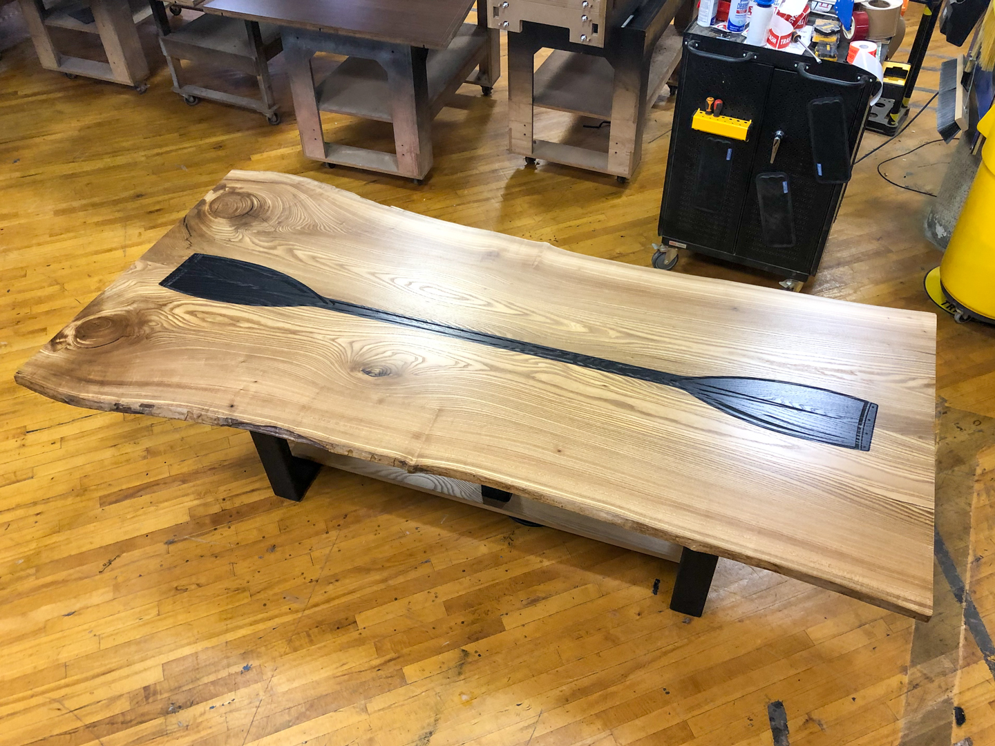solid wood table with logo